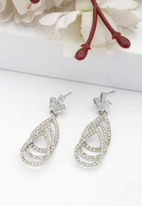 Gleaming Three-Tiered Diamond Drop Earrings